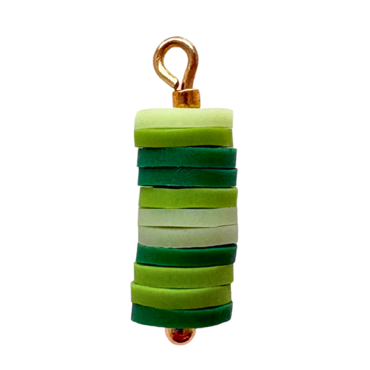 green stacked charm with gold accents