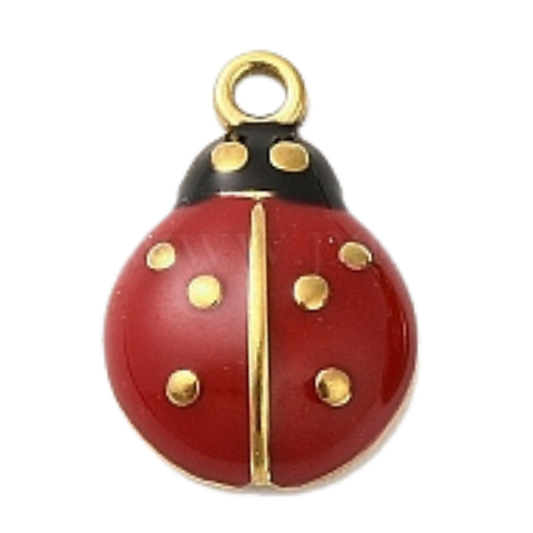 Red ladybug charm with gold accents 