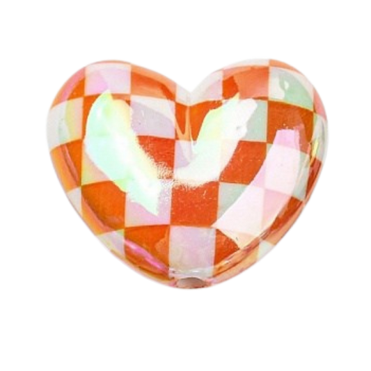 Heart-shaped charm with a checkered pattern in orange